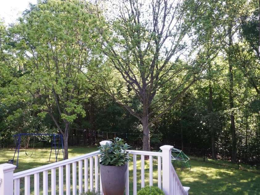 854 Silver Fox Drive, Concord, NC 28025.  MLS# CAR4251256, YatesRealty ID 26171. The deck that is same level as the screened in porch.