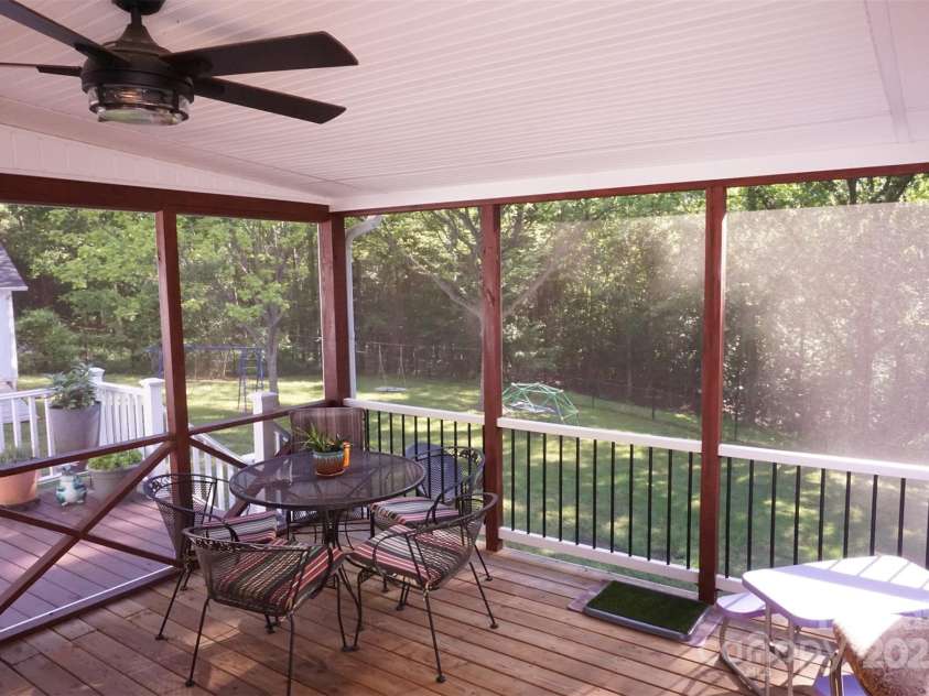 854 Silver Fox Drive, Concord, NC 28025.  MLS# CAR4251256, YatesRealty ID 26171. The perfect place for coffee in the morning. A view over the tranquil backyard.