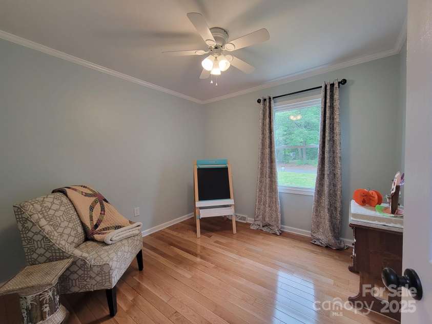 854 Silver Fox Drive, Concord, NC 28025.  MLS# CAR4251256, YatesRealty ID 26171. This is the playroom/bonus/office with a full closet.