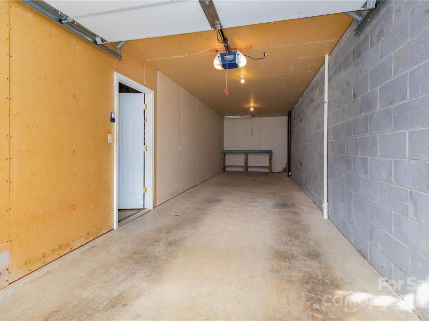 1510 Graham Road, Marshall, NC 28753.  MLS# CAR4241264, YatesRealty ID 26172. Basement Garage