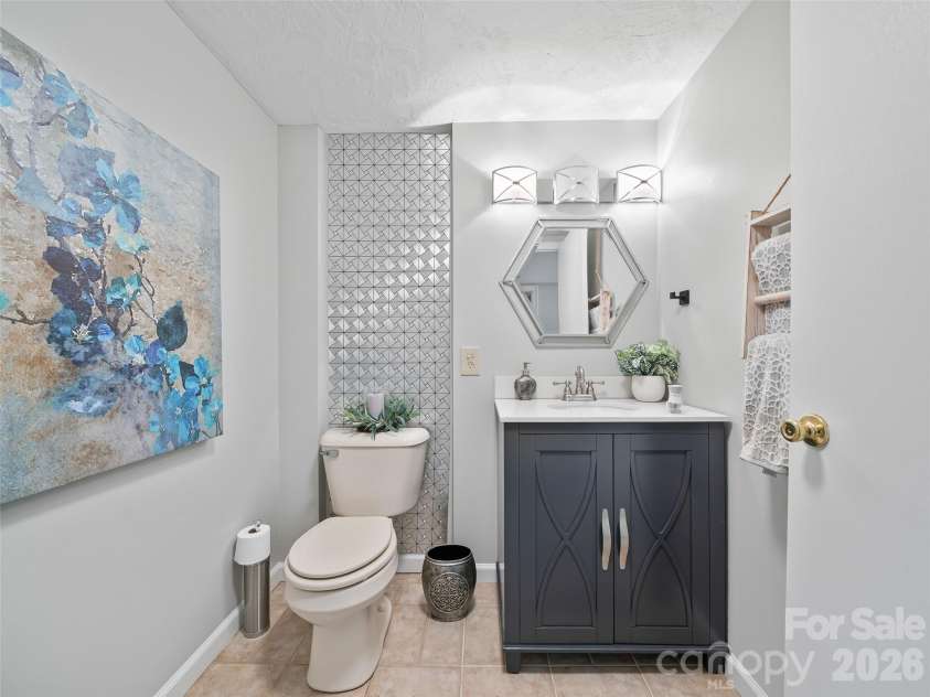 357 Rosewood Lane, Burnsville, NC 28714.  MLS# CAR4385330, YatesRealty ID 26173. Half Bath