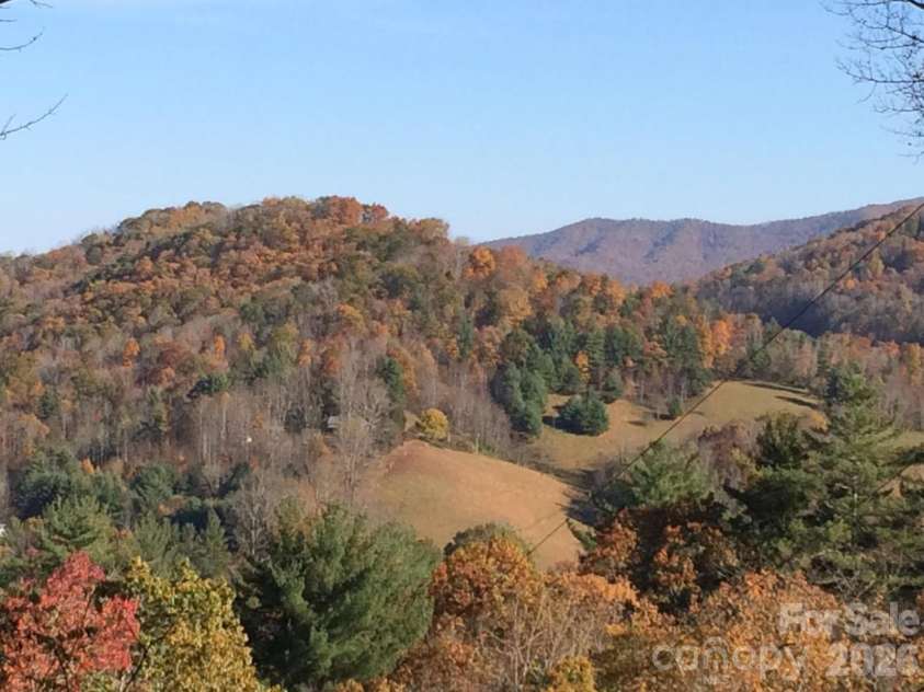 357 Rosewood Lane, Burnsville, NC 28714.  MLS# CAR4385330, YatesRealty ID 26173. Long range mountain view