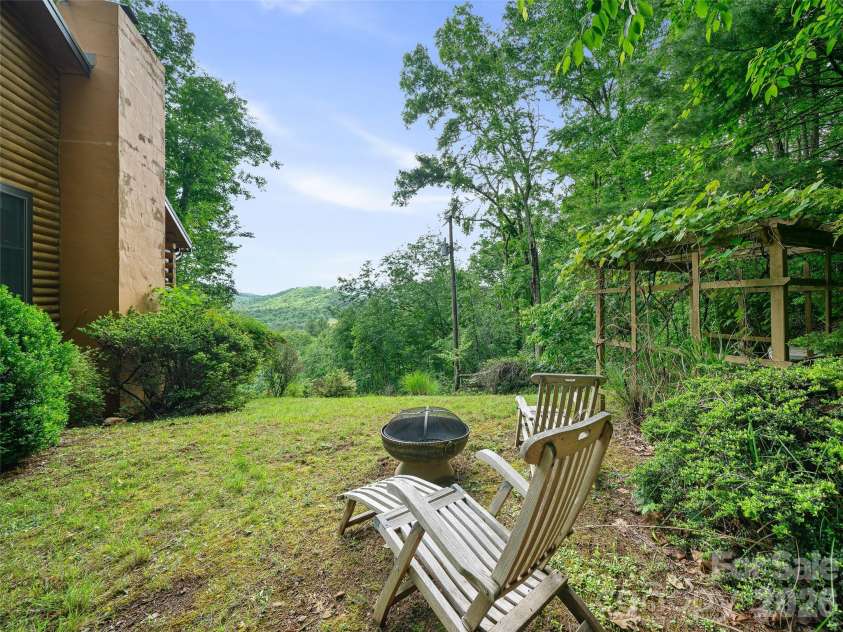 357 Rosewood Lane, Burnsville, NC 28714.  MLS# CAR4385330, YatesRealty ID 26173. Side view with view
