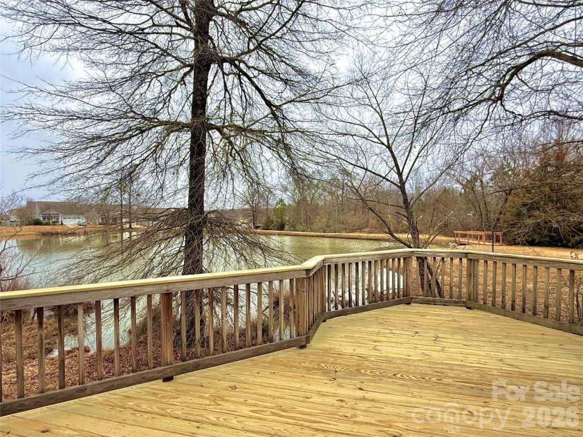 5227 Crystal Lakes Drive, Rock Hill, SC 29732.  MLS# CAR4338532, YatesRealty ID 26181. Back Deck with Pond View