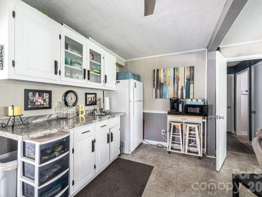 2651 31st Street Court, Hickory, NC 28601.  MLS# CAR4385317, YatesRealty ID 26183. Mini kitchen area basement