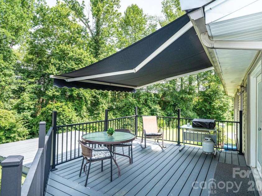 2651 31st Street Court, Hickory, NC 28601.  MLS# CAR4385317, YatesRealty ID 26183. Rear deck off the dining room , retractable awning for sun/rain coverage
