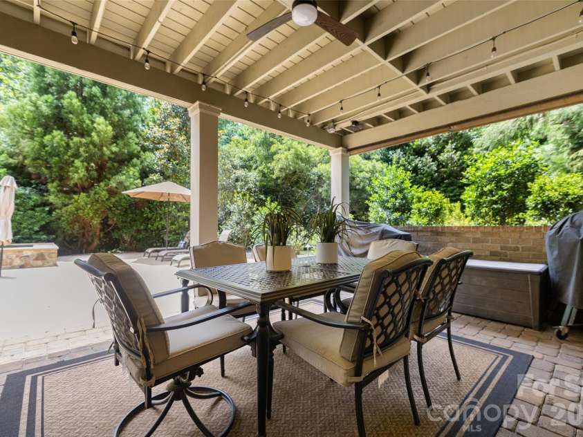 8703 Deakin Court, Waxhaw, NC 28173.  MLS# CAR4385726, YatesRealty ID 26184. Covered pool patio area