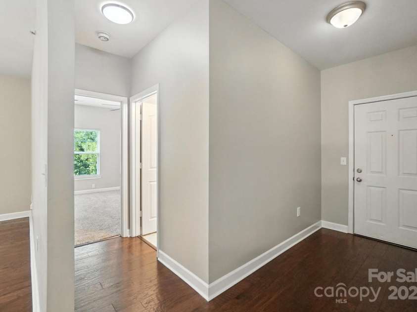 12435 Copper Mountain Boulevard, Charlotte, NC 28277.  MLS# CAR4278005, YatesRealty ID 26188. Hallway to Bedroom 1