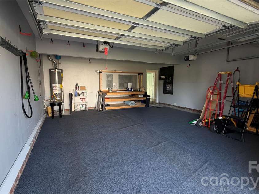 11234 Huntington Meadow Lane, Charlotte, NC 28273.  MLS# CAR4386495, YatesRealty ID 26195. Finished garage