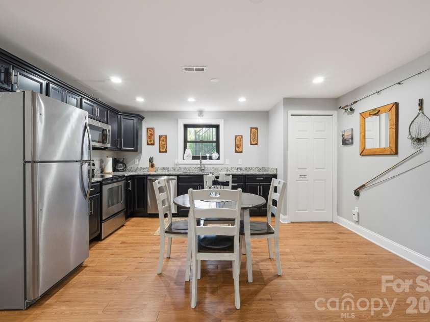 2549 Lake Shore Road, Denver, NC 28037.  MLS# CAR4385563, YatesRealty ID 26196. Basement kitchen and dining