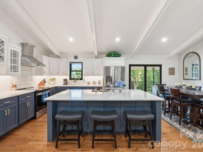 2549 Lake Shore Road, Denver, NC 28037.  MLS# CAR4385563, YatesRealty ID 26196. Kitchen island has extra storage under stools