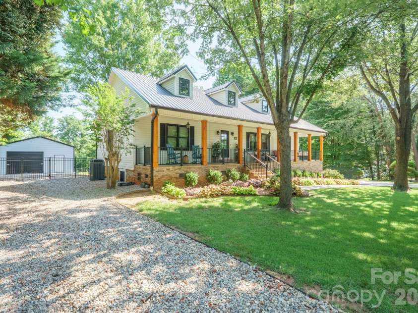 2549 Lake Shore Road, Denver, NC 28037.  MLS# CAR4385563, YatesRealty ID 26196. Second driveway to detached boat/storage garage