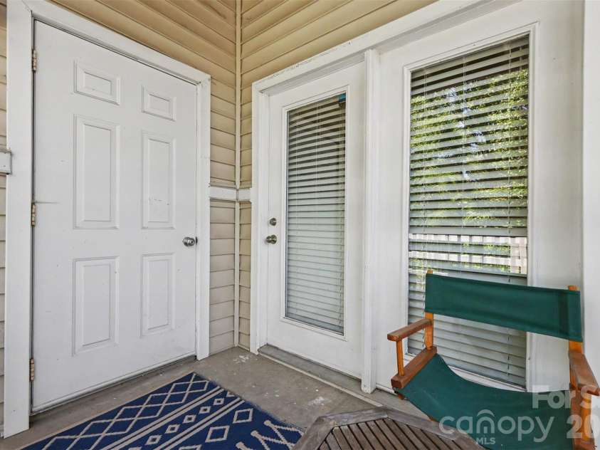 10616 Hill Point Court, Charlotte, NC 28262.  MLS# CAR4385583, YatesRealty ID 26199. Back patio with storage