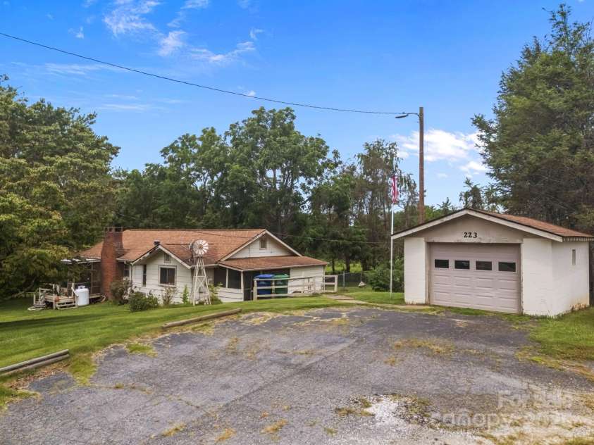 0000 New Leicester Highway, Asheville, NC 28806.  MLS# CAR3603724, YatesRealty ID 262. Existing SFR could be future rental or office