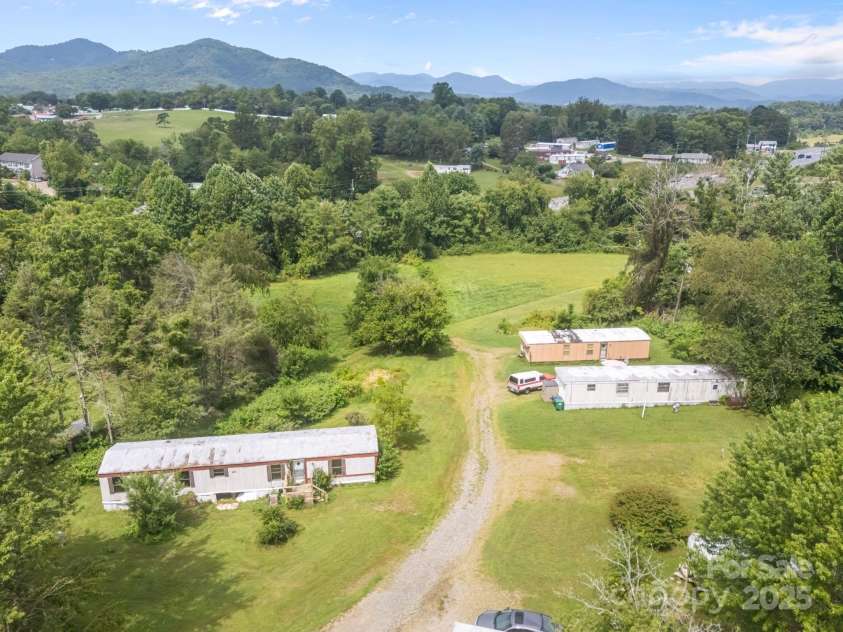 0000 New Leicester Highway, Asheville, NC 28806.  MLS# CAR3603724, YatesRealty ID 262. Includes 9 Mobile Home pads