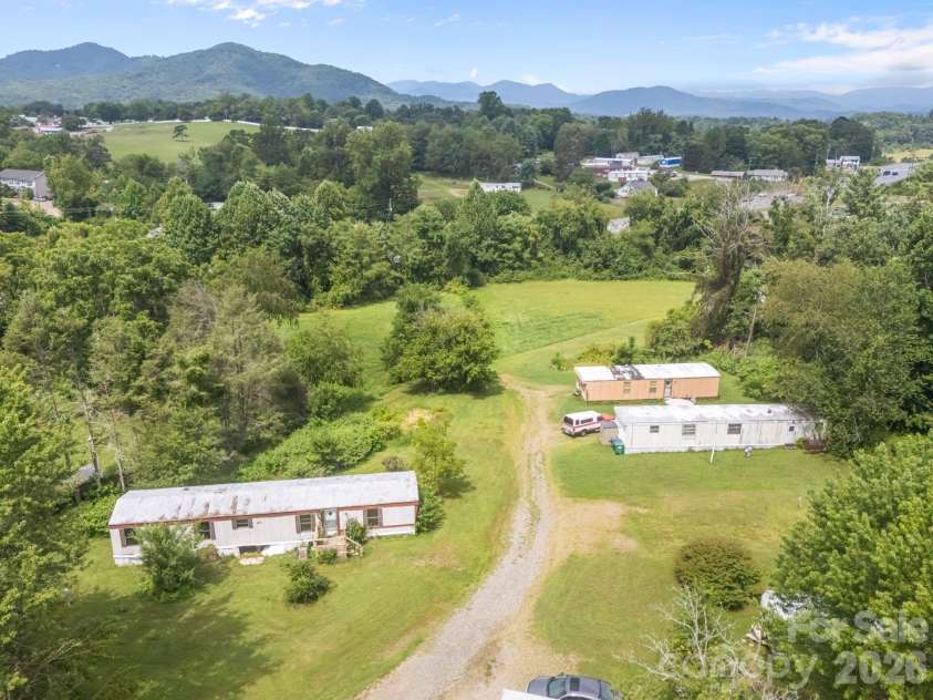 0000 New Leicester Highway, Asheville, NC 28806.  MLS# CAR3603724, YatesRealty ID 262. Includes 9 Mobile Home pads