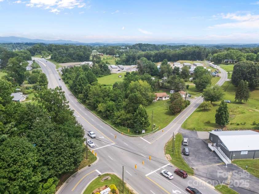 0000 New Leicester Highway, Asheville, NC 28806.  MLS# CAR3603724, YatesRealty ID 262. Signalized corner acreage New Leicester Hwy Asheville