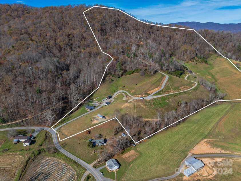 435 N Turkey Creek Road, Leicester, NC 28748.  MLS# CAR4199119, YatesRealty ID 262. 83+ acres property boasting a great mix of pastures and forests, and several springs/ creeks!