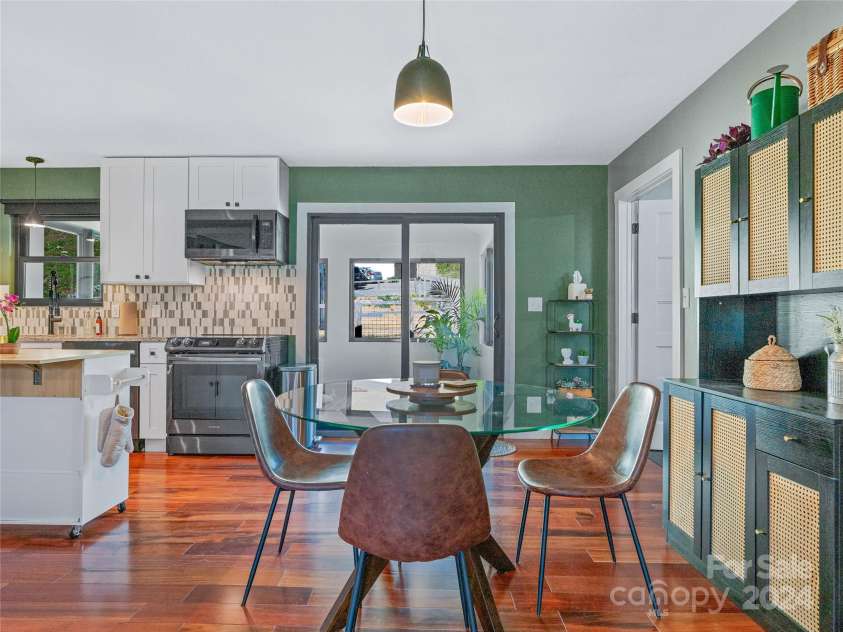 435 N Turkey Creek Road, Leicester, NC 28748.  MLS# CAR4199119, YatesRealty ID 262. Main house dining area