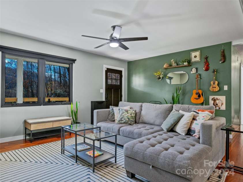 435 N Turkey Creek Road, Leicester, NC 28748.  MLS# CAR4199119, YatesRealty ID 262. Main house living room