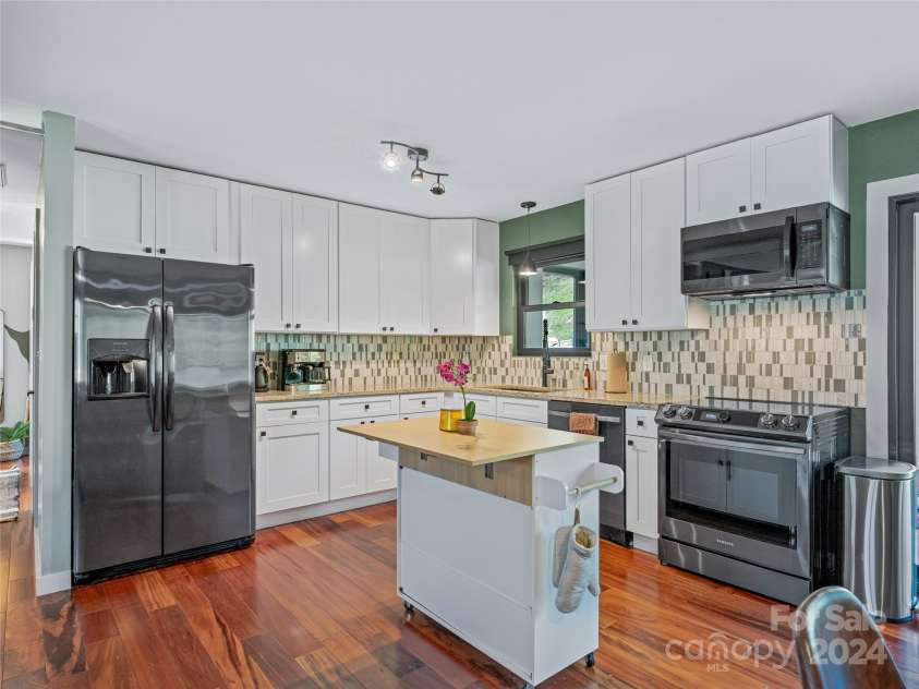 435 N Turkey Creek Road, Leicester, NC 28748.  MLS# CAR4199119, YatesRealty ID 262. Main house, updated kitchen!