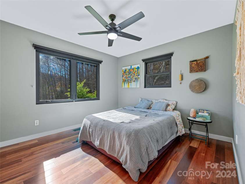 435 N Turkey Creek Road, Leicester, NC 28748.  MLS# CAR4199119, YatesRealty ID 262. Primary bedroom gets southern exposure/main house