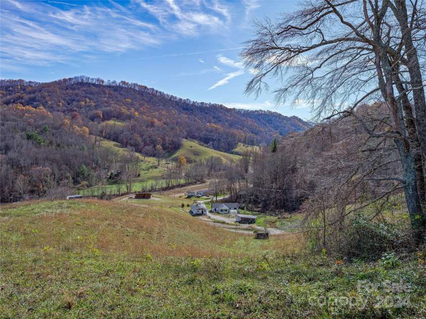435 N Turkey Creek Road, Leicester, NC 28748.  MLS# CAR4199119, YatesRealty ID 262. Standing at the corner of the north east pasture looking south west, at the homestead