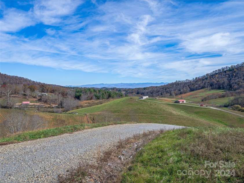 435 N Turkey Creek Road, Leicester, NC 28748.  MLS# CAR4199119, YatesRealty ID 262. Taking the road up to the back of the land, pausing to look east towards the Black Mountain Range!