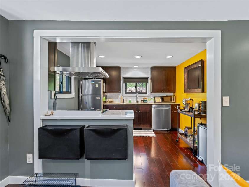 435 N Turkey Creek Road, Leicester, NC 28748.  MLS# CAR4199119, YatesRealty ID 262. The carriage house kitchen