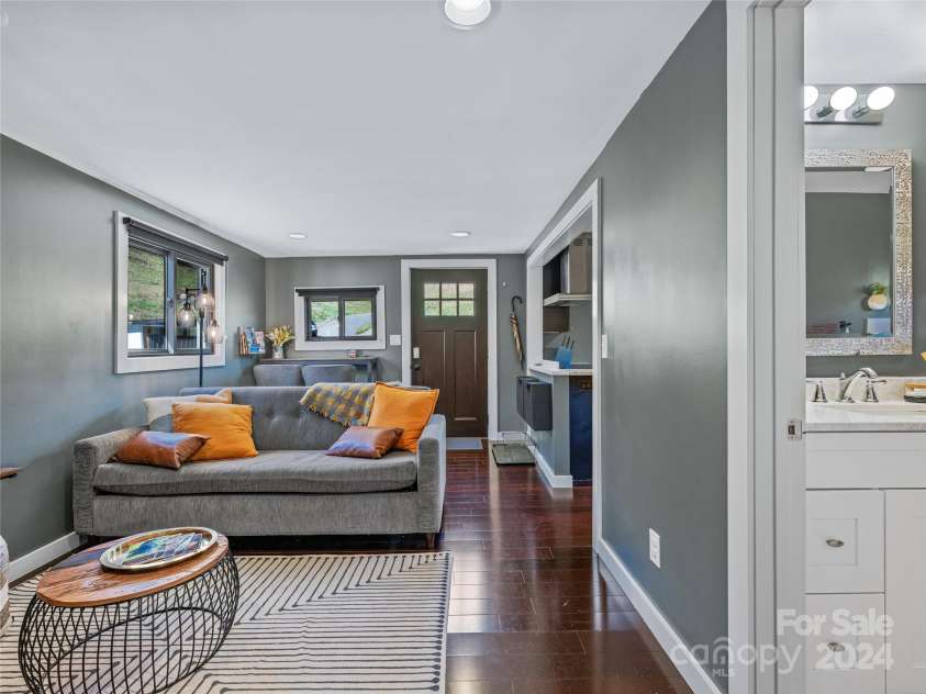 435 N Turkey Creek Road, Leicester, NC 28748.  MLS# CAR4199119, YatesRealty ID 262. View to living rooms and entrance of the carriage house