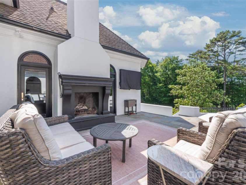 5400 Challisford Lane, Charlotte, NC 28226.  MLS# CAR4383848, YatesRealty ID 26209. Main Deck with Fireplace
