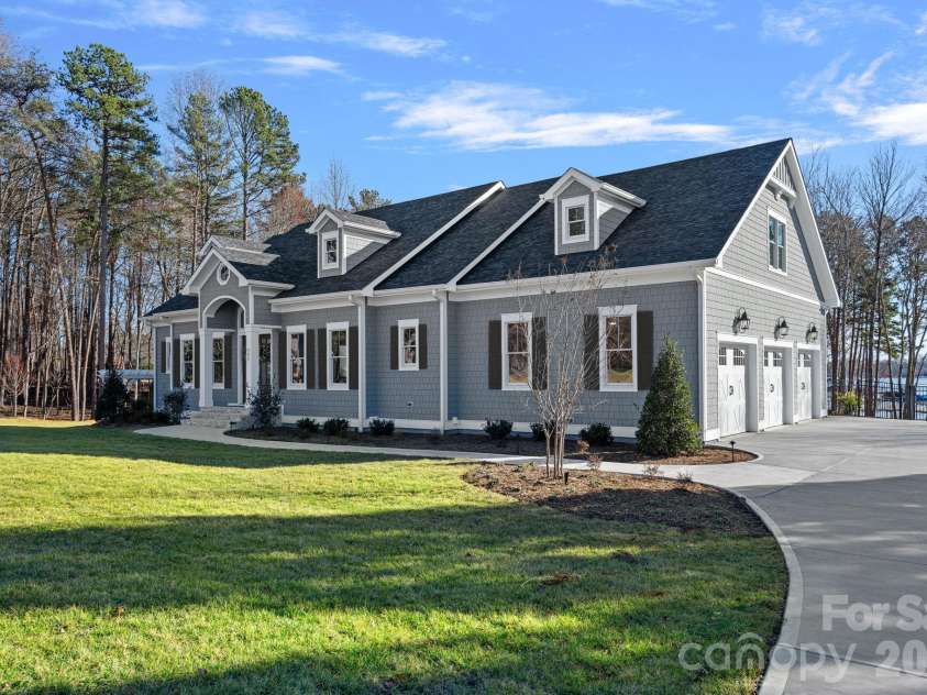 111 Kent Court, Mooresville, NC 28117.  MLS# CAR4347479, YatesRealty ID 26216. Classic Cape Cod Architecture in The Point`