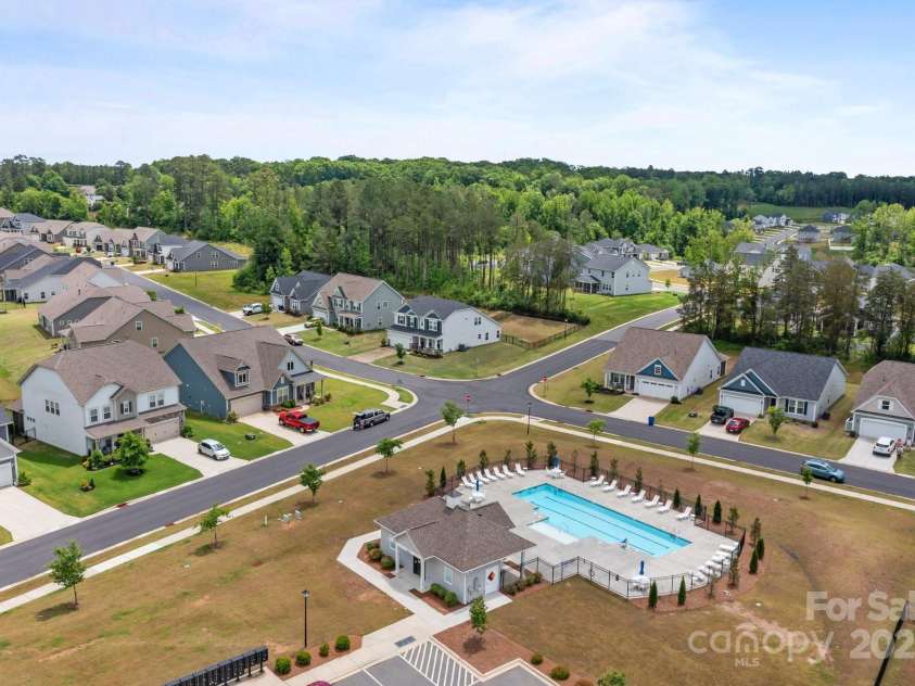 7604 Tanglewood Way, Denver, NC 28037.  MLS# CAR4258922, YatesRealty ID 26216. Across the street from Pool