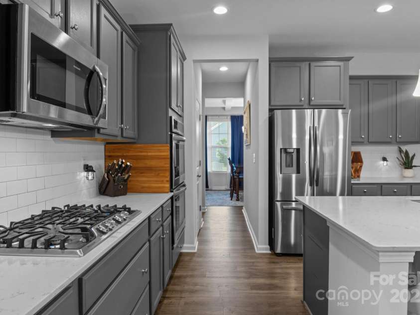 7604 Tanglewood Way, Denver, NC 28037.  MLS# CAR4258922, YatesRealty ID 26216. Kitchen to Formal Dining Room