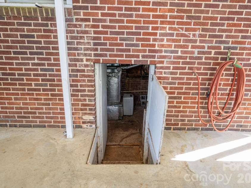 5309 Hickory Grove Road, Stanley, NC 28164.  MLS# CAR4361259, YatesRealty ID 26220. Access to the basement