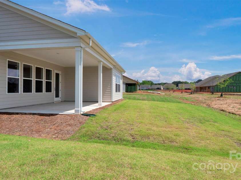 1031 Rabbit Hill Lane, Monroe, NC 28110.  MLS# CAR4281979, YatesRealty ID 26222. Back exterior