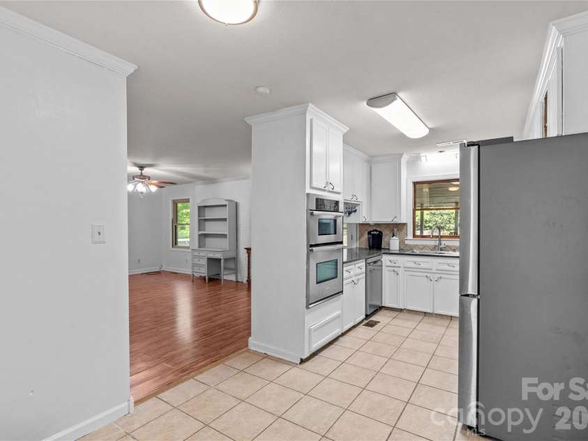 868 Fieldstone Road, Mooresville, NC 28115.  MLS# CAR4377553, YatesRealty ID 26226. Kitchen Overlooking Pool