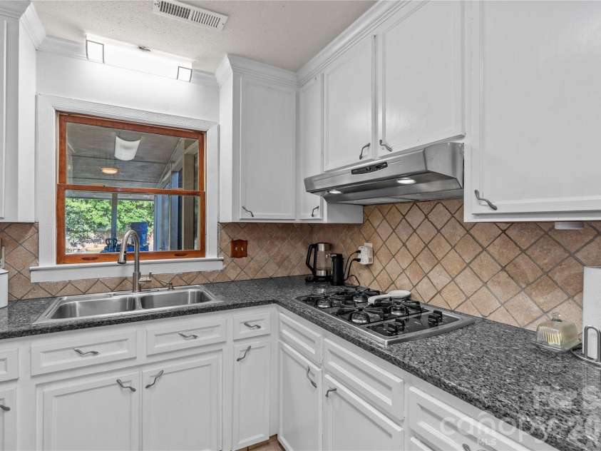 868 Fieldstone Road, Mooresville, NC 28115.  MLS# CAR4377553, YatesRealty ID 26226. Kitchen Overlooking Pool