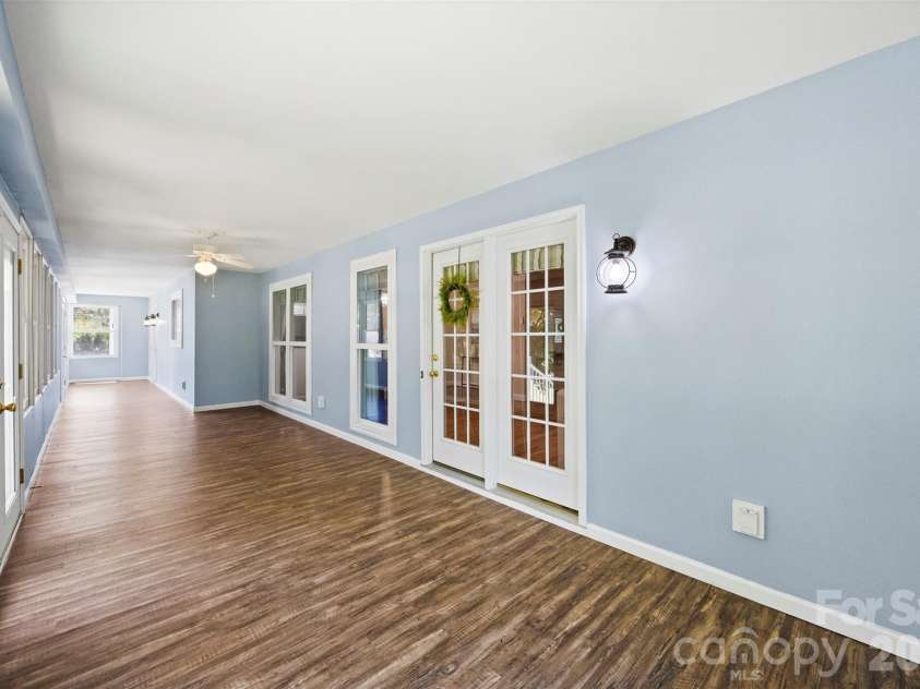 5639 White Store Road, Wingate, NC 28174.  MLS# CAR4384824, YatesRealty ID 26238. Enclosed Porch Overlooking Back yard