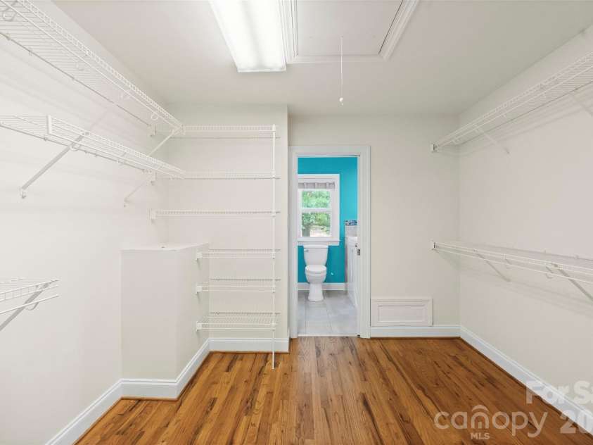 5639 White Store Road, Wingate, NC 28174.  MLS# CAR4384824, YatesRealty ID 26238. Primary closet connecting 2 full bathrooms