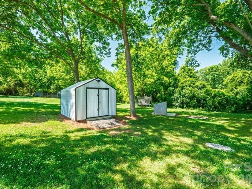 3407 Ratchford Drive, Gastonia, NC 28056.  MLS# CAR4385064, YatesRealty ID 26239. Shed