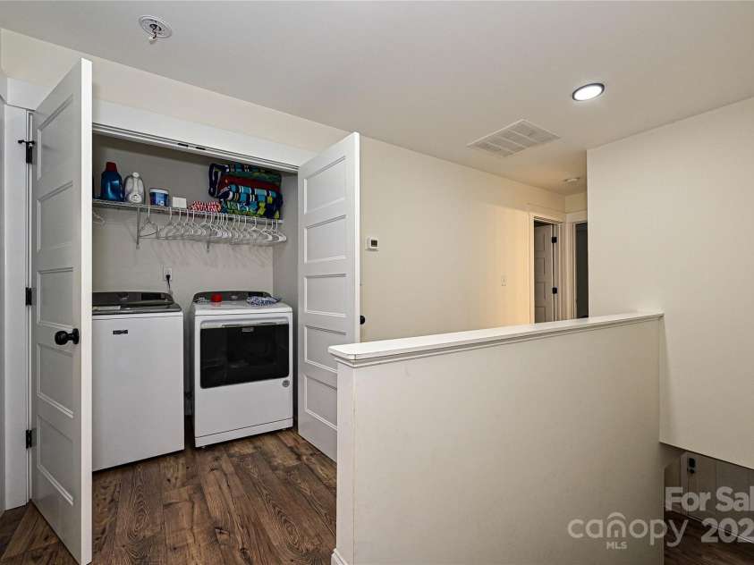 3020 Quiet Lane, Iron Station, NC 28080.  MLS# CAR4259783, YatesRealty ID 26247. Second floor laundry closet.