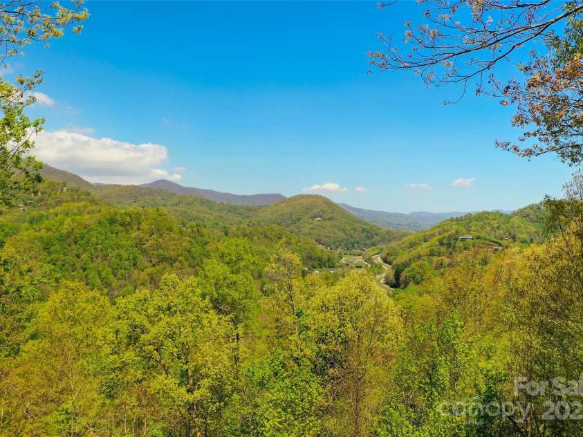 927 Henry Dingus Way, Maggie Valley, NC 28751.  MLS# CAR4252374, YatesRealty ID 26250. Great mountain views from deck
