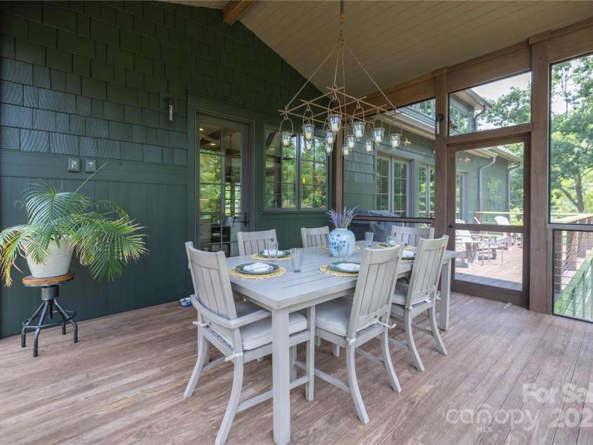 65 Wandering Oaks Way, Asheville, NC 28805.  MLS# CAR4267136, YatesRealty ID 26255. Screened in porch with ceiling fan