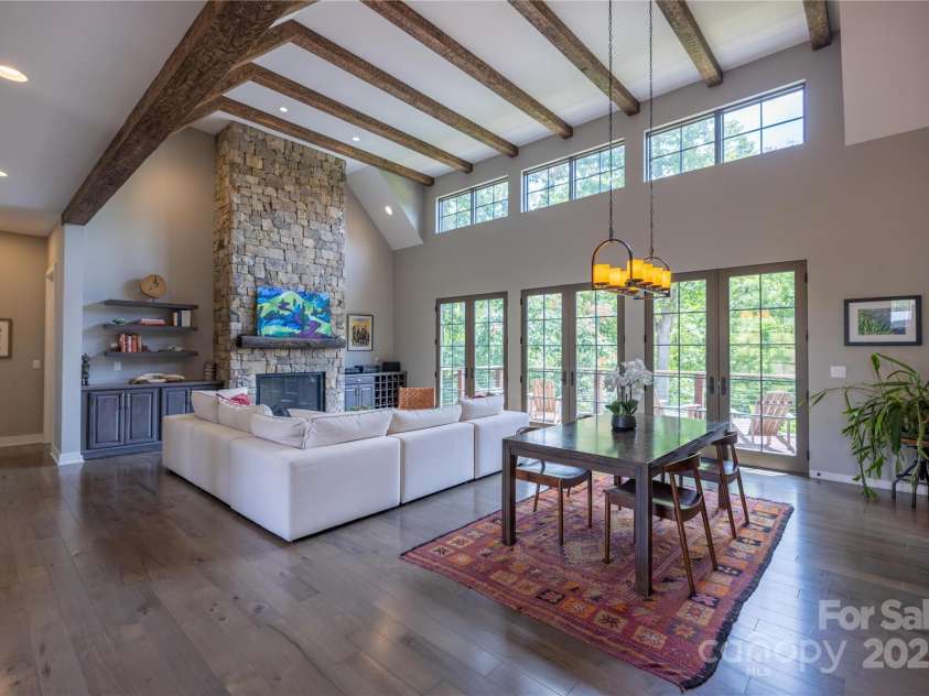 65 Wandering Oaks Way, Asheville, NC 28805.  MLS# CAR4267136, YatesRealty ID 26255. Tons of windows to bring the outdoors in