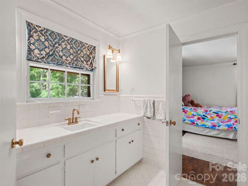 441 Claymont Street, Concord, NC 28025.  MLS# CAR4381482, YatesRealty ID 26271. The primary bathroom is shared with a second bedroom