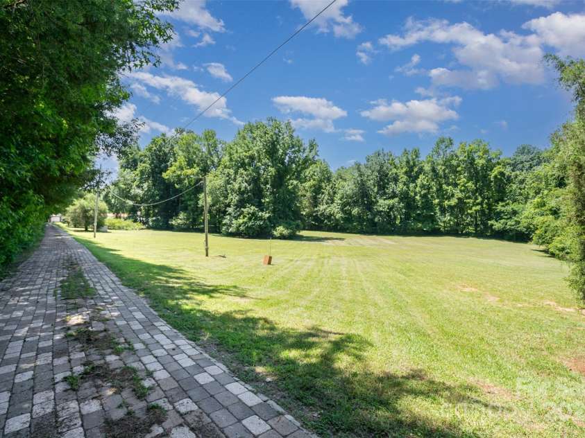 495 Brumley Road, Mooresville, NC 28115.  MLS# CAR4272935, YatesRealty ID 26284. 4.14 Acre