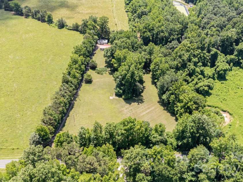 495 Brumley Road, Mooresville, NC 28115.  MLS# CAR4272935, YatesRealty ID 26284. Ariel View from front side of house