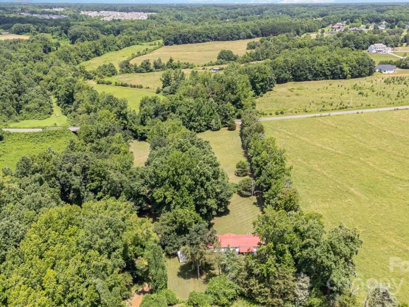 495 Brumley Road, Mooresville, NC 28115.  MLS# CAR4272935, YatesRealty ID 26284. Back side of house Ariel View