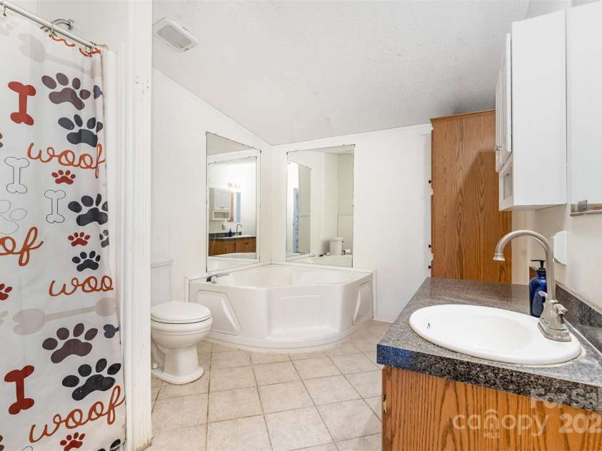 495 Brumley Road, Mooresville, NC 28115.  MLS# CAR4309551, YatesRealty ID 26284. Primary bathroom